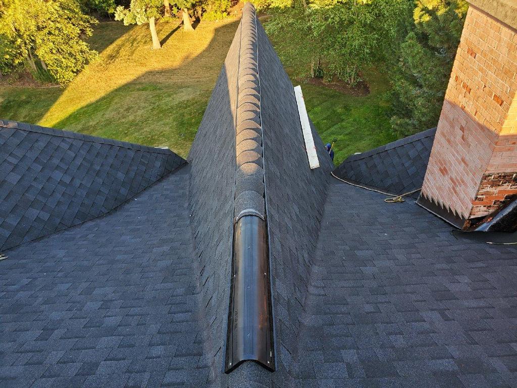Downers Grove roofing contractors install Owens Corning VentSure® 4-Foot Strips with Owens Corning DuraRidge® Hip & Ridge Shingles