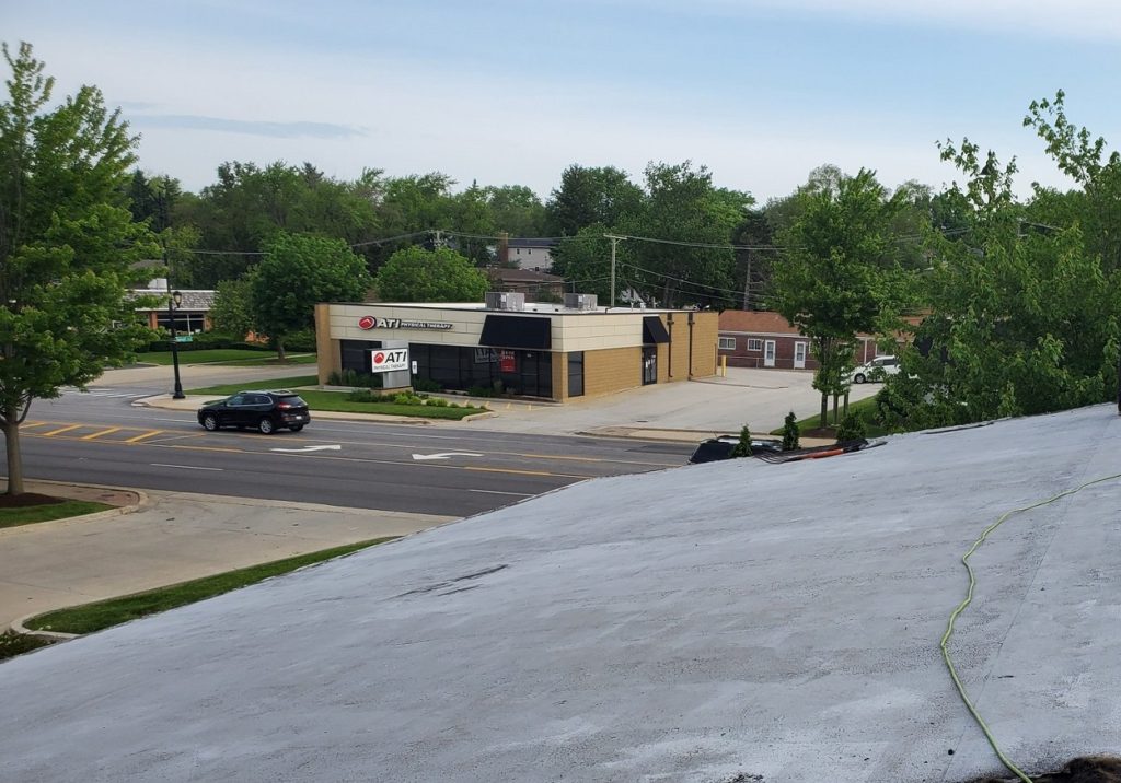 Photo before Glen Ellyn roofing contractor converts the flat roof