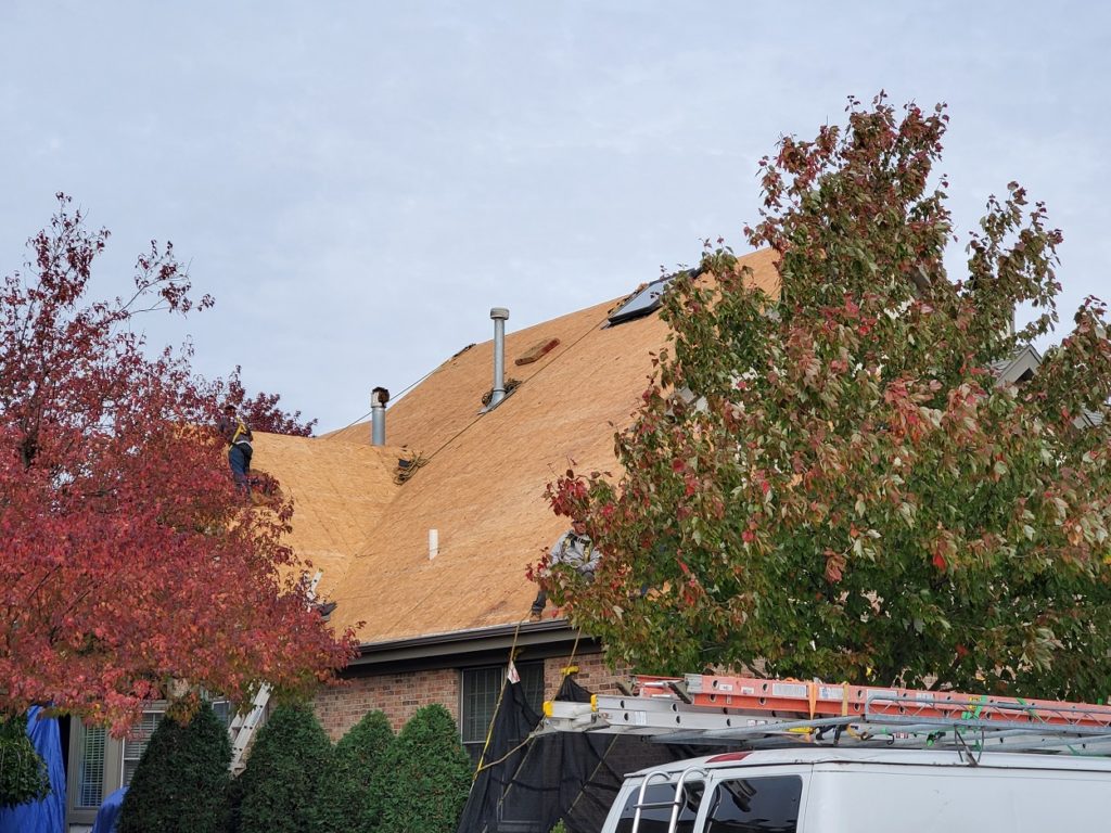 Orland Park roofing contractor removes decking on roof