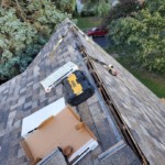 lombard roofing contractor installs duration shingles in sand dune color