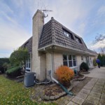 before picture of the concrete tile mansard roof before replacement by a northbrook roofing contractor